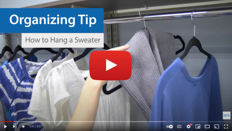 A screenshot of a YouTube video from OrganizedLiving that offers a way to hang sweaters on a hanger without stretching them out.