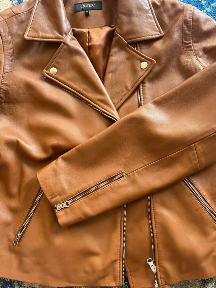 detail of the zippers and hardware on the quince washed leather biker jacket by wardrobe oxygen