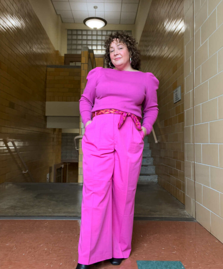 Alison Gary of Wardrobe Oxygen in a pink puff sleeve sweater and matching trousers from Ann Taylor