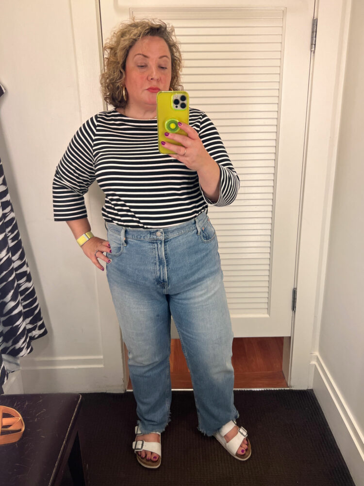 Alison of Wardrobe Oxygen in a black and white striped Breton tee from Universal Standard and ABLE Chessie straight jeans