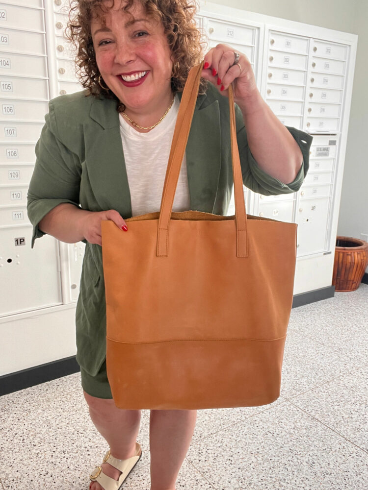 Able leather totebag held by Alison at Wardrobe Oxygen