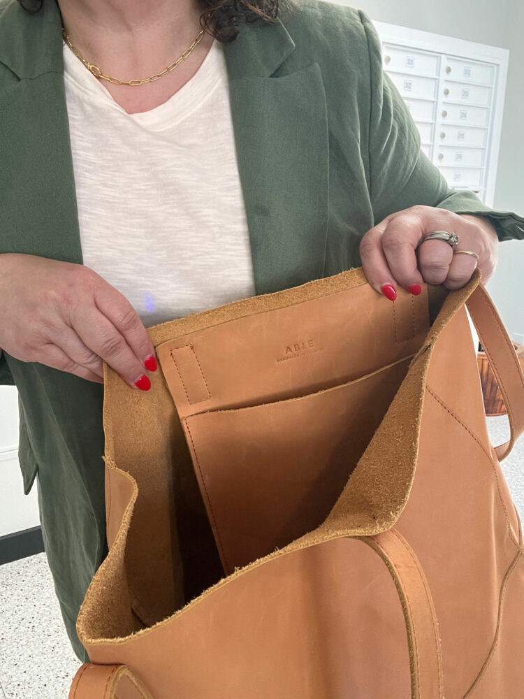 Able leather totebag held by Alison at Wardrobe Oxygen