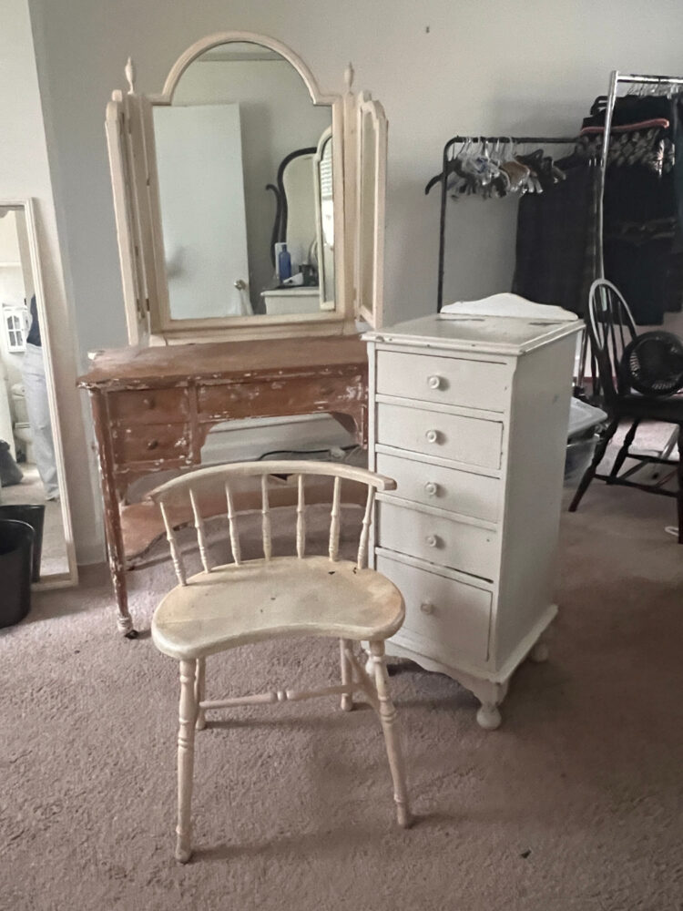 My mom's partially stripped dressing table, matching bench, and a tall narrow chest of drawers ready to be sent to be updated 