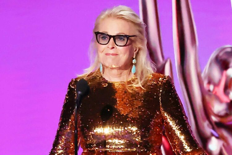 Candice Bergen at the 2024 Emmy Awards wearing a copper sequined long sleeve gown from Dolce and Gabbana with turquoise drop earrings