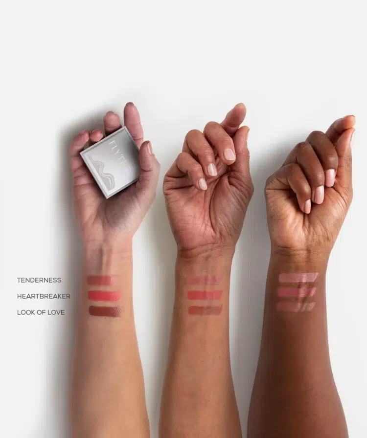 Flyte.70 Hazy Cheek.Creme blush shown on the wrists of three women of different skintones