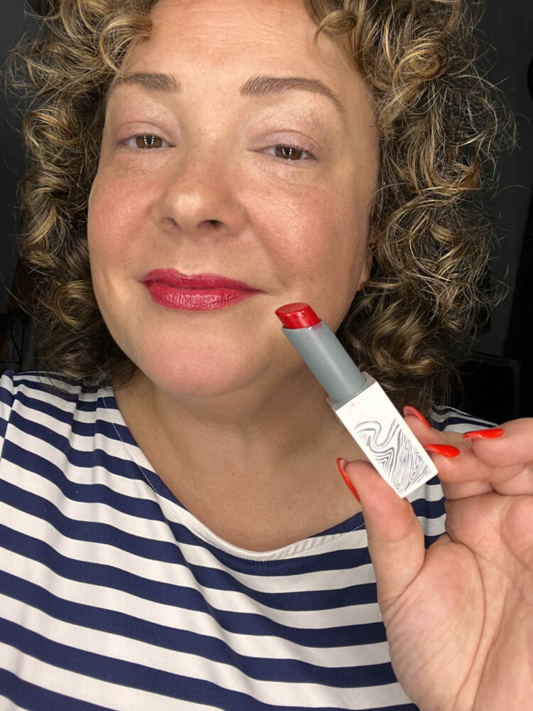 Alison Gary of Wardrobe Oxygen wearing the Flyte.70 L+L Lip.Lacquer in the color Relax, an apple red