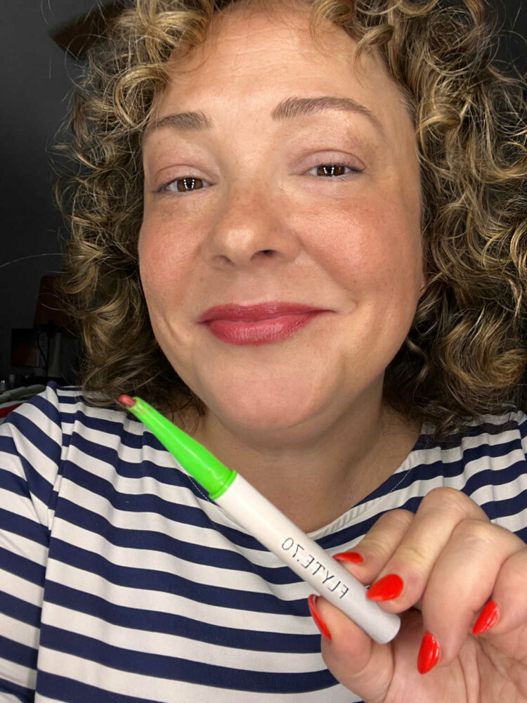 Alison Gary of Wardrobe Oxygen wearing the Flyte.70 Chiseled Lip liner in Sabotage; she filled her entire lip with the color leaving a satin finish of a berry brown shade.