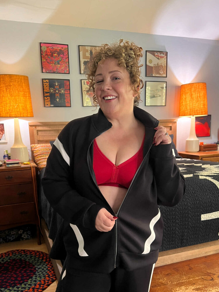 Alison Gary of Wardrobe Oxygen in a Lane Bryant LIVI track suit and Cacique red cotton wireless bra