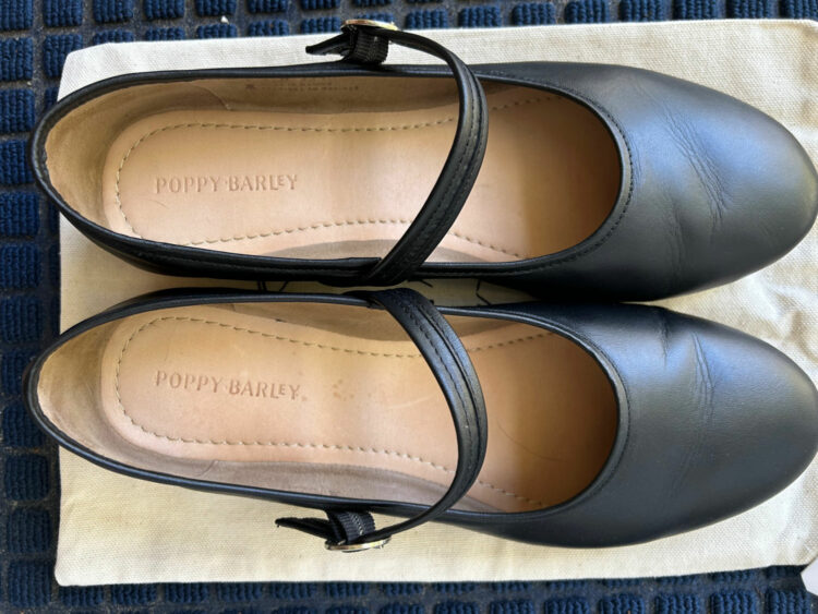 A pair of black Mary Jane shoes from Poppy Barley worn two days with creasing at the toe