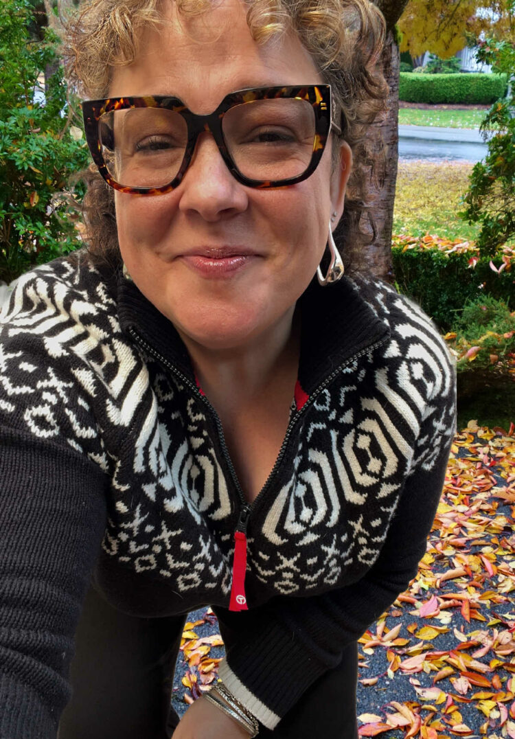 aliso gary of wardrobe oxygen in a black and white fair isle quarter zip sweater from talbots