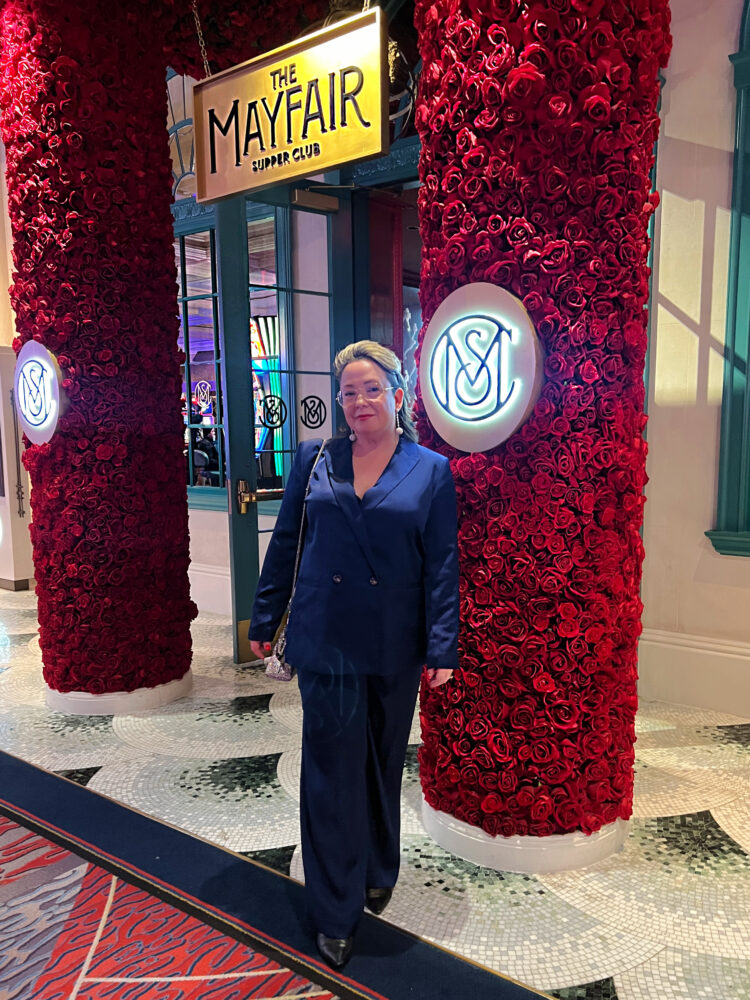 alison in ann taylor navy satin pantsuit at the mayfair supper club in las vegas 2025