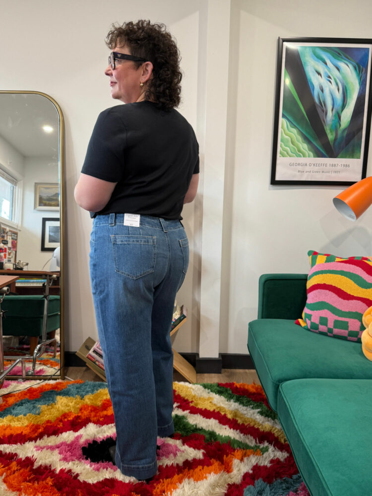 Alison Gary of Wardrobe Oxygen in a black t-shirt tucked into the Talbots Classic Jean Trousers - Renwick Wash